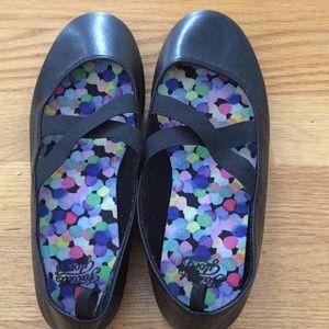 Black strapped flats